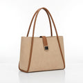 Beige tote bag with brown trim and long handles