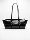 Black patent finish shoulder tote bag with gold-tone buckles